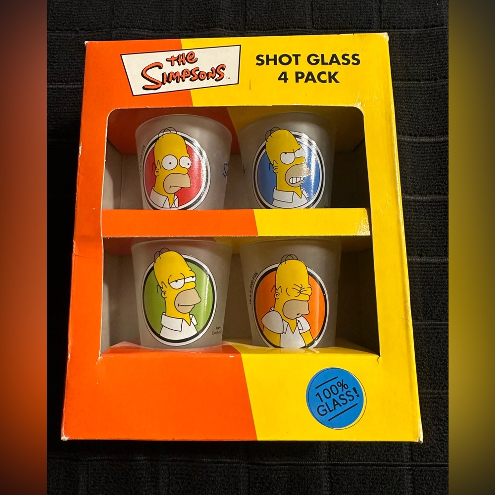New inbox set of four Homer Simpson shot glasses. They are frosted glass.